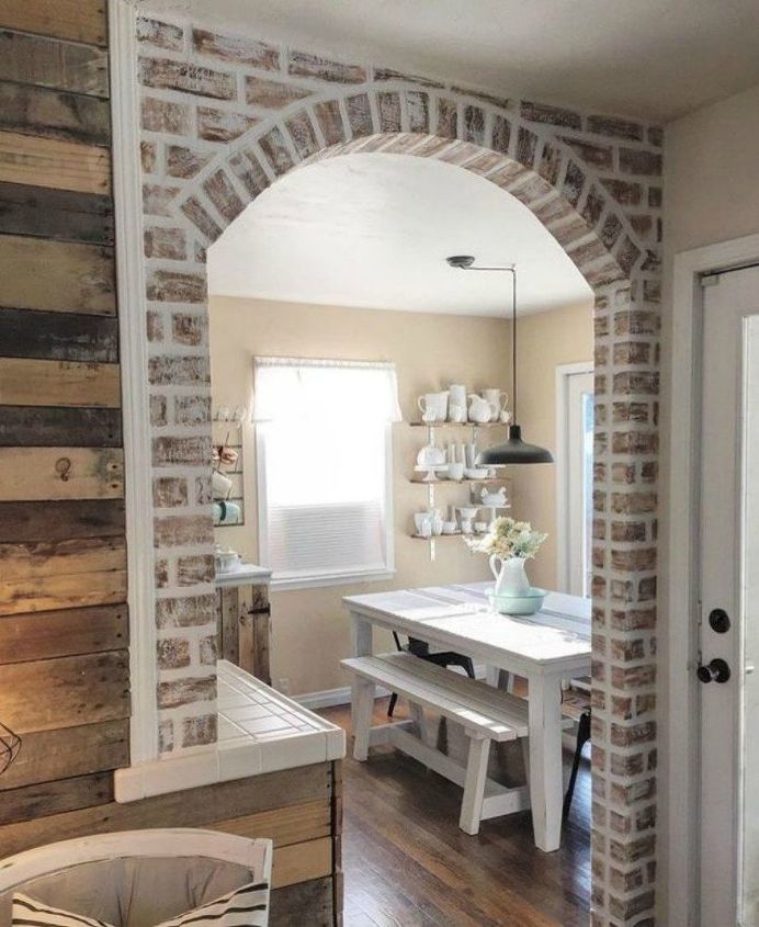 s 12 stunning ways to get that exposed brick look in your home, Grab a piece of lumber for a faux brick arch