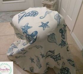 we used an old shower curtain to recover these old chairs
