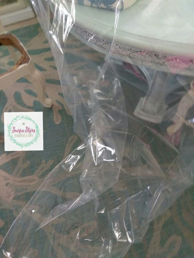 we used an old shower curtain to recover these old chairs