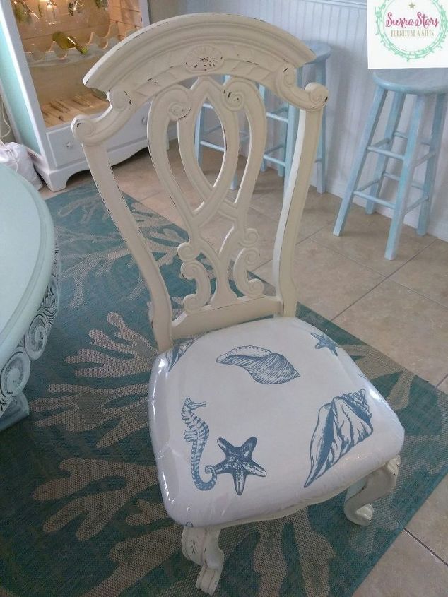 we used an old shower curtain to recover these old chairs