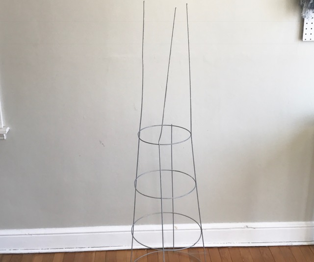 turn a tomato cage into a plant stand