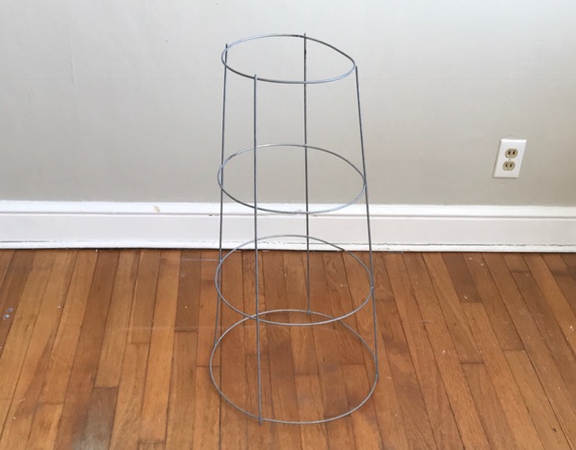 turn a tomato cage into a plant stand