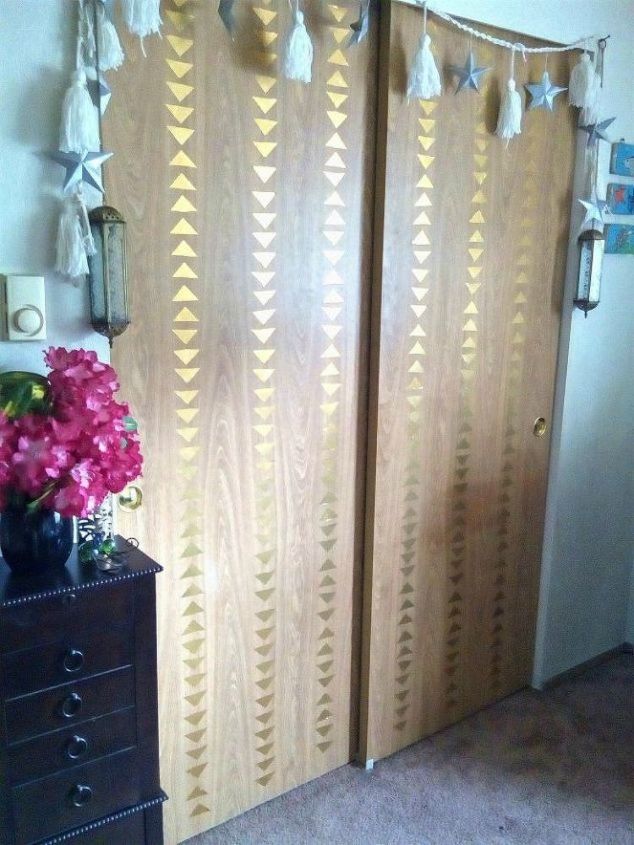13 amazing closet door transformations that will change your room, These chic gold arrow boho doors