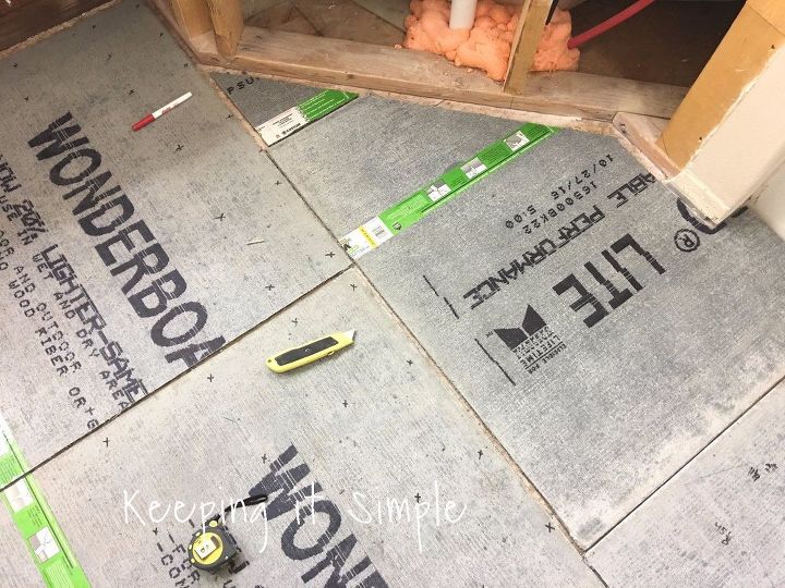how to tile a bathroom floor with 12x24 gray tiles