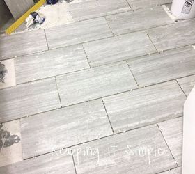 how to tile a bathroom floor with 12x24 gray tiles