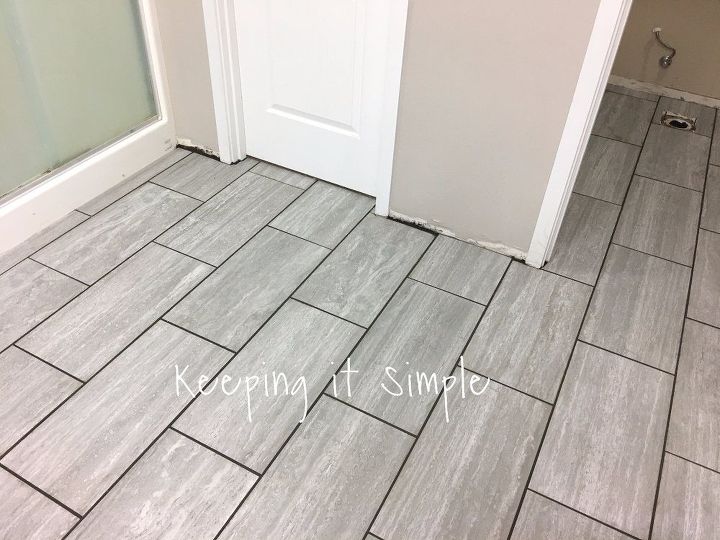 how to tile a bathroom floor with 12x24 gray tiles