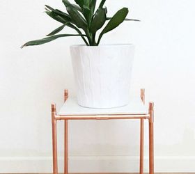 the 15 coolest ways to reuse pipes in your home decor, Turn copper pipe into a luxurious plant stand