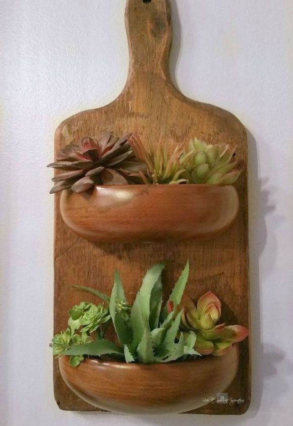 transform old cutting boards into these 12 nifty items, Or add wooden bowls to them for planters