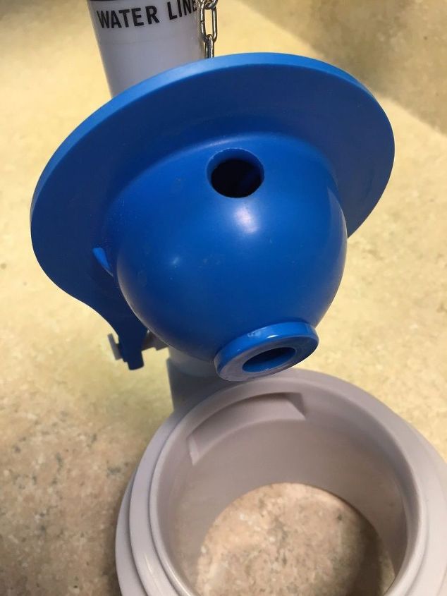 how to stop holding the toilet handle down so it flushes completely, Old flapper in the open flush position