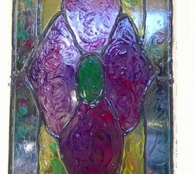 faux stained glass window with unicorn spit