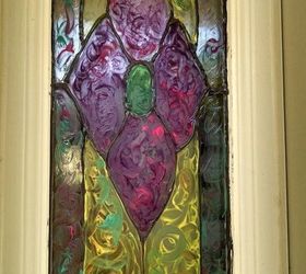 faux stained glass window with unicorn spit