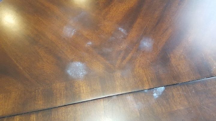 q white spots on breakfast room table