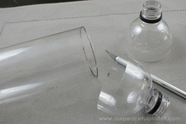 self watering planters from soda bottles