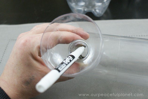 self watering planters from soda bottles