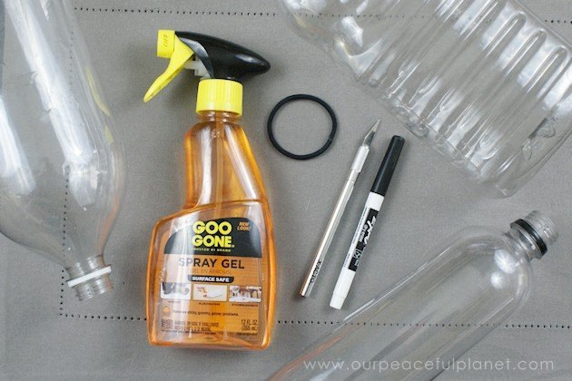 self watering planters from soda bottles