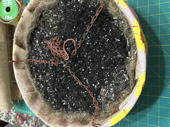 no more coconut liners for my hanging baskets