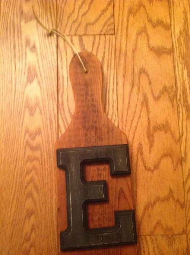 eat sign with dollar store letters on reclaimed lumber