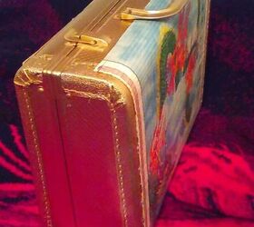 upcyled small brief suitcase with vintage calendars