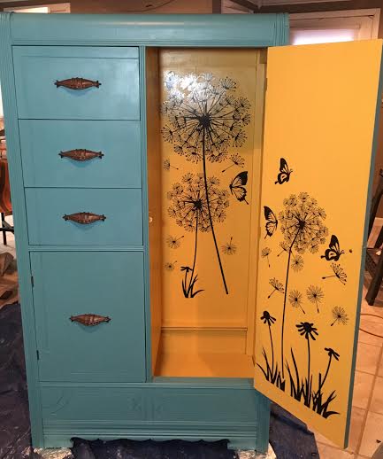 a custom painted wardrobe and dresser