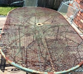 q what can i cover an oval outdoor rusty picnic table with