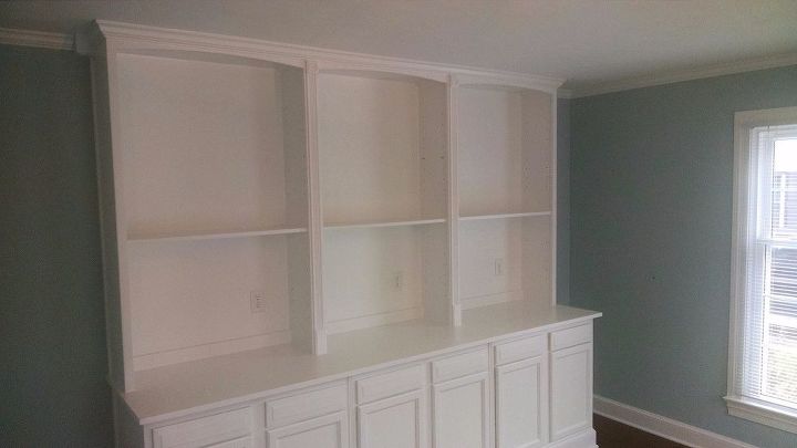 built in bookcase hack using kitchen cabinets and bookcases