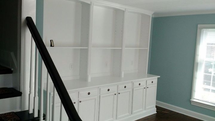 built in bookcase hack using kitchen cabinets and bookcases