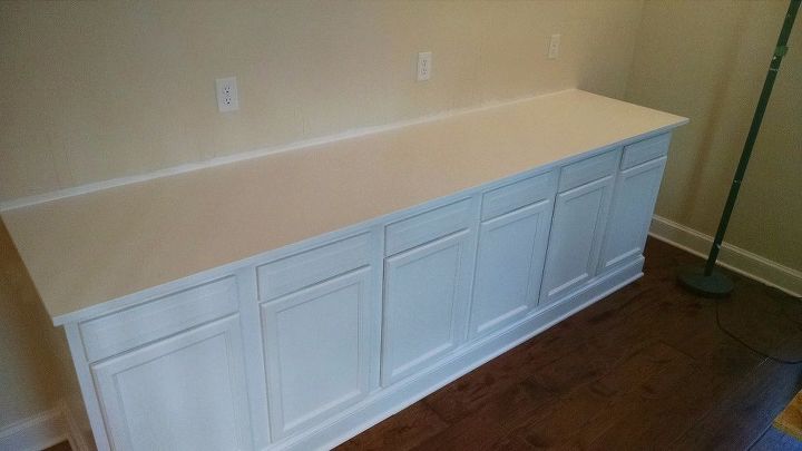 built in bookcase hack using kitchen cabinets and bookcases