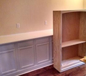 built in bookcase hack using kitchen cabinets and bookcases