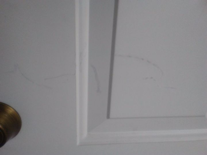 remove scuffs scratches from metal door