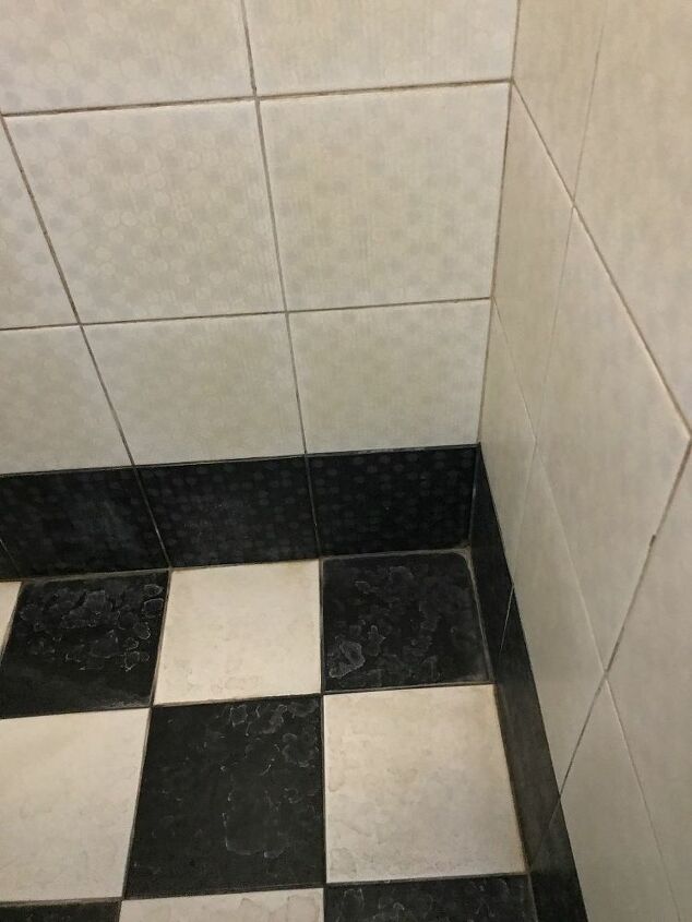 q need help on removing stains on bathroom tiles