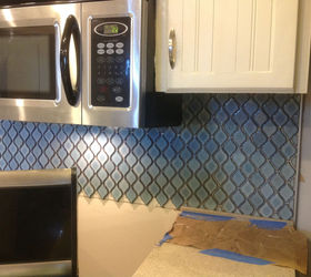 arabesque blue tile backsplash using an adhesive mat