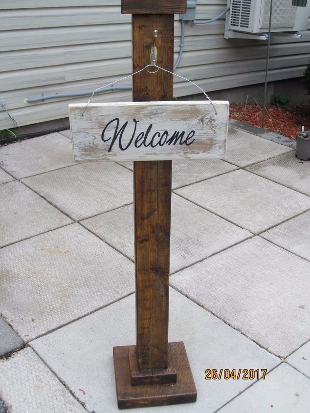 q welcome sign