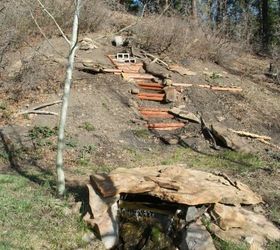 how to build a backyard waterfall up a slope, foundation of treated timber and cement block