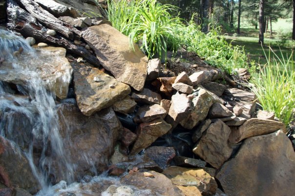 how to build a backyard waterfall up a slope, Side view from basin
