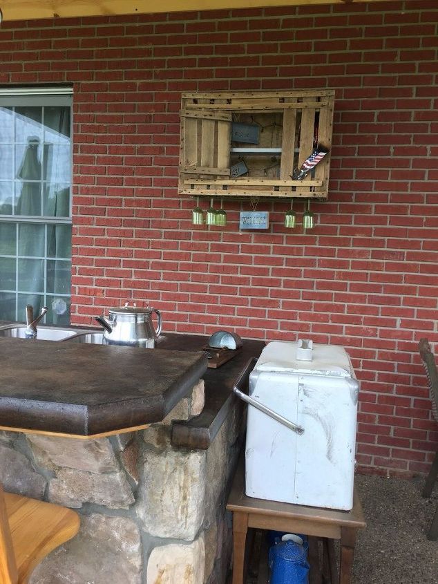 patio bar cabinet or chicken coop, and so it hangs