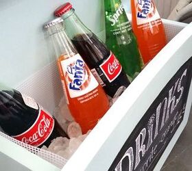 an old table without legs gets transformed into a summer drink station