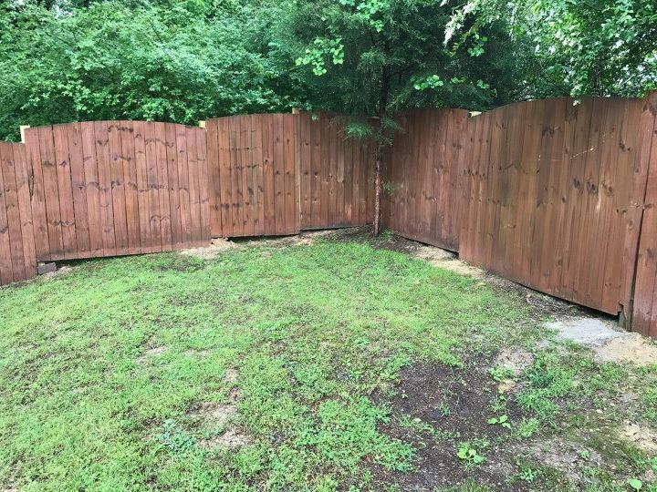 q how to cover gaps at bottom of wood fence