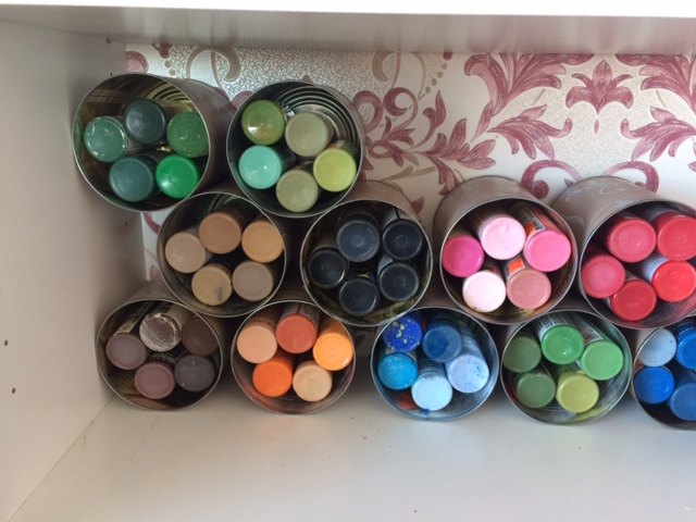 s 9 hacks for the life of a paint artist, Organize Your Paints With Decorative Cans