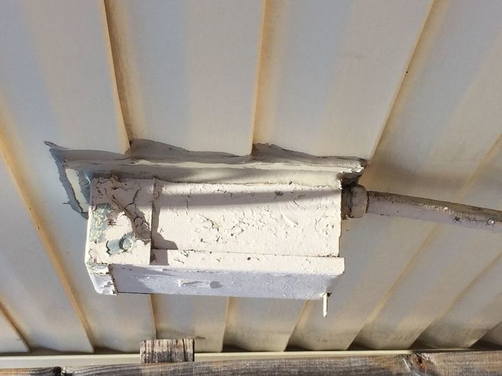 q how can i disguise an air conditioner electrical box on a patio wall