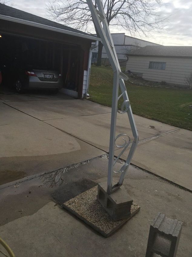 q husband backed into the column that holds up my patio roof