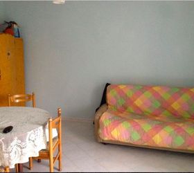 dull italian living room gets a dramatic makeover, Horrible square room with horrible furniture
