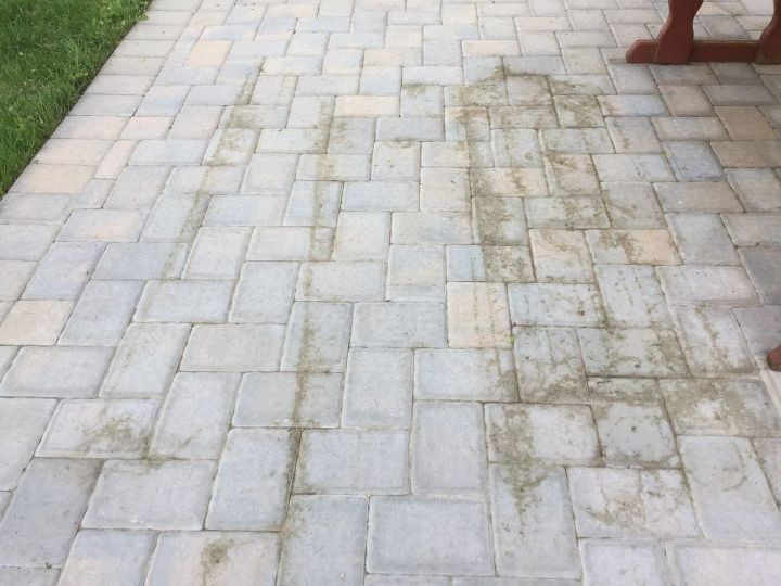 q how do i clean pavers stained by a hose trellis dirt laying on them