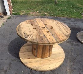 up cycled wood spool serving table