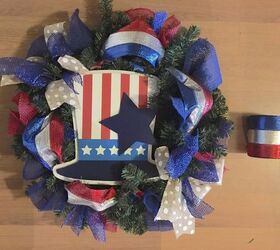turn a pine wreath into a patriotic wreath, 4 Wide ribbon poofs on each side