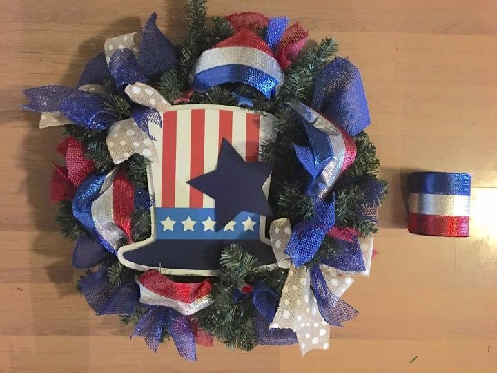 turn a pine wreath into a patriotic wreath, 4 Wide ribbon poofs on each side