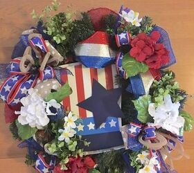 turn a pine wreath into a patriotic wreath, Time to add florals and greenery