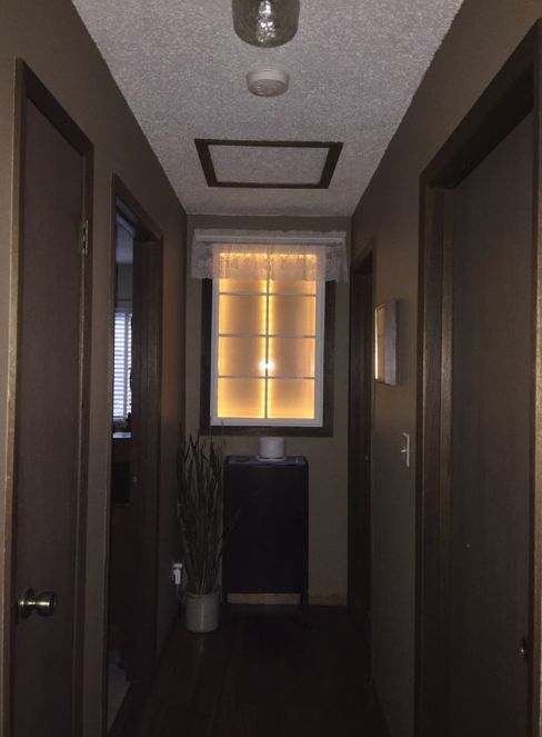 lighten up a dark hallway with a new window