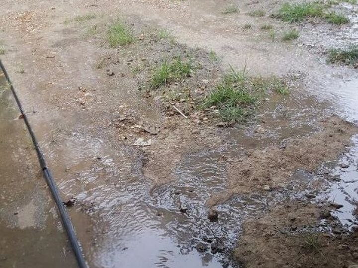 q how can i fix a serious drainage problem by my front porch