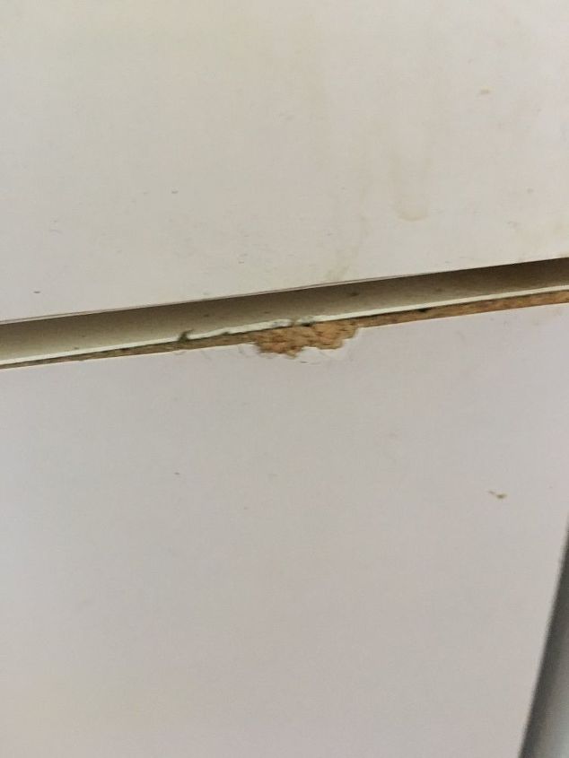q how can i fix the bottom of my kitchen formica doors that are starting