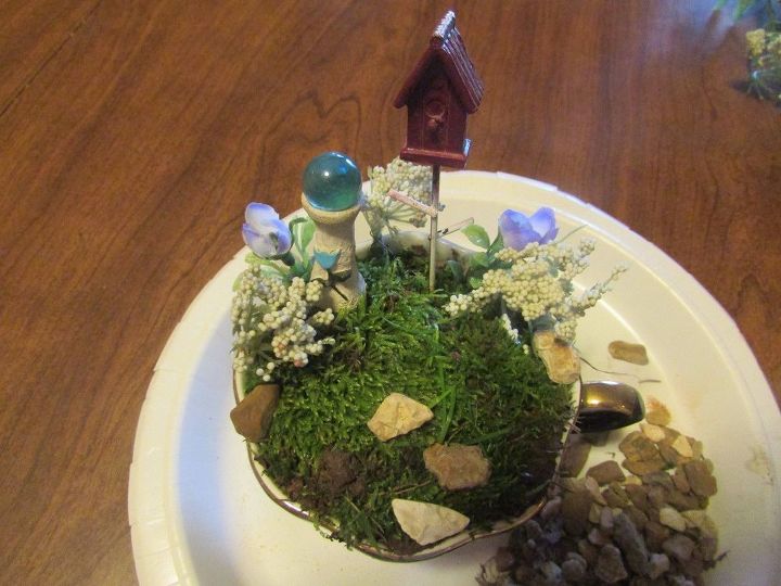 mini fairy garden in a tea cup